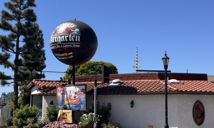 Old World Oktoberfest globe sign at Old World Village in Huntington Beach, photo by Scott Bourquin