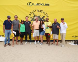 A Great Day in the Stoke 2026 volunteers and supporters on the sand in Huntington Beach