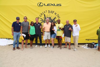 A Great Day in the Stoke 2026 volunteers and supporters on the sand in Huntington Beach